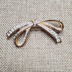 Kenneth Jay Lane Gold Tone Bow Brooch.